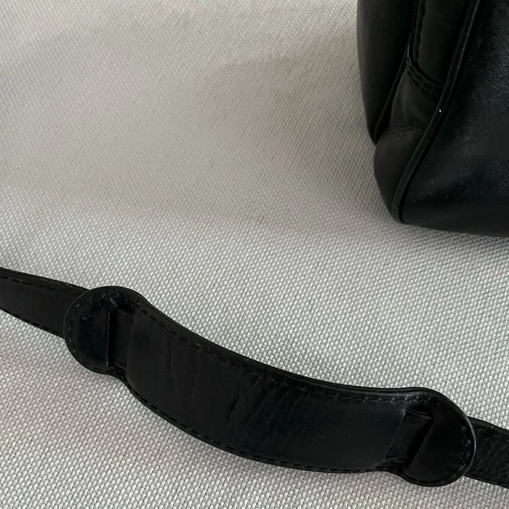 Vintage 70’s Luciano black Italian leather messenger bag.